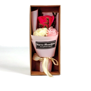 Detailed gift box with red roses and white carnations made of high-quality soap flowers