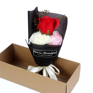 Detail of 3-flower soap bouquet with roses and carnation in a brown gift box