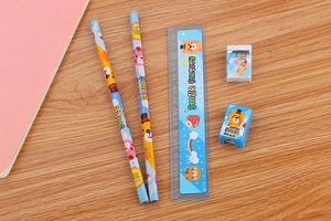 Detailed flat lay of blue bear stationery set with pencils, ruler, eraser and sharpener