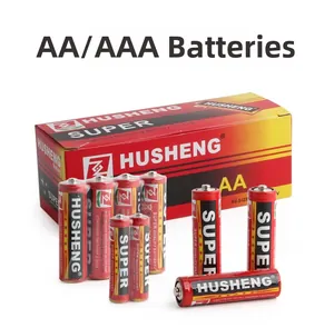 Close-up of AA and AAA R6 dry batteries with red finish and product packaging box