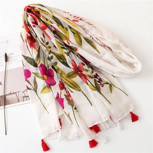 Vintage floral linen scarf with colorful flower prints and fringe tassels on edges