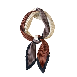 Pleated square silk scarf featuring a brown, beige, and black patchwork striped design