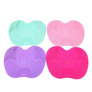 Close-up of partitioned texture zones on large silicone makeup brush cleaning mats