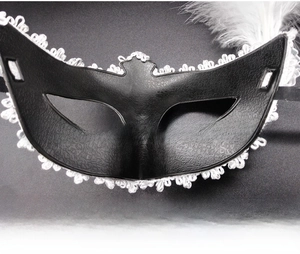 Detail view of the black party mask back lining with an elastic strap for comfort