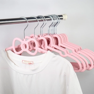 Pink bow-shaped anti-slip plastic clothes hangers for girls' dorm laundry and storage