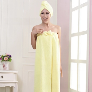 Close-up of yellow microfiber wearable bath towel set with elastic bow and hair drying cap