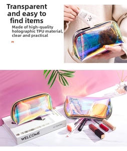 Detail of high-quality holographic TPU makeup bag showing the smooth metal zipper closure