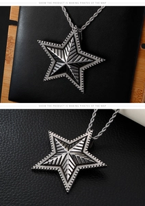 Macro shot of retro star pendant with textured details and twisted rope chain necklace