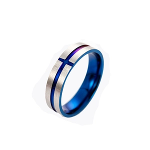Vintage stainless steel cross ring with blue groove inlay on white background