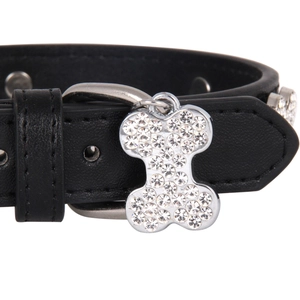 Classic black leather dog collar with a sparkling rhinestone-studded bone pendant