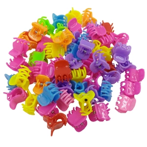 Colorful mini plastic hair clips in heart and butterfly shapes for girls and toddlers