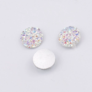 Detail of 10mm resin druzy cabochons with iridescent sparkles and silver metal backing
