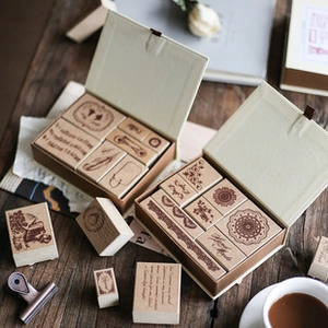 Macro shot of vintage wooden rubber stamps for DIY scrapbooking and journal decoration