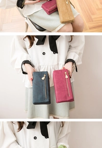 Detailed close-up of retro PU leather wallets in dark blue, rose, yellow and green colors
