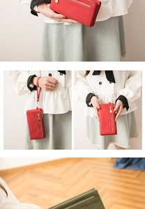 Detail view of vintage long PU leather wallets in red and green with a zipper strap
