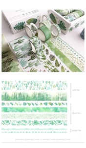 Macro view of botanical washi tape set featuring green leaf patterns and sizes