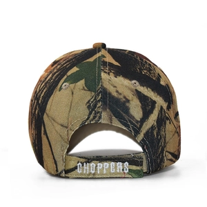 Close-up of adjustable velcro strap with white CHOPPERS embroidery on camouflage baseball cap