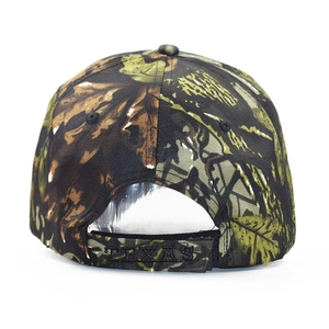 Detail view of camouflage baseball cap back with TEXAS embroidery on adjustable strap
