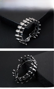 Detailed view of punk style bullet shaped stainless steel bracelet with lobster clasp