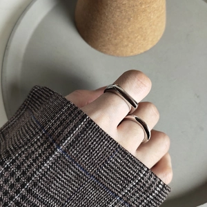 Polished 925 sterling silver rings set showing thick square and thin round band detail