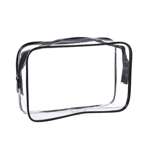 Thick waterproof PVC transparent cosmetic bag with black zipper trim for travel toiletries