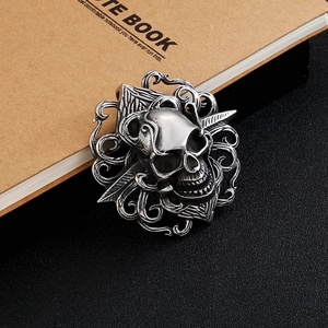 Gothic skull pendant in spade shape made of polished stainless steel for rock style