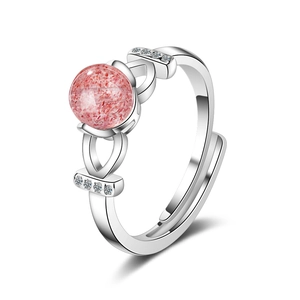Adjustable silver ring with round pink strawberry quartz and side crystal accents