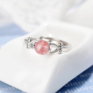 Adjustable silver ring with pink strawberry quartz stone and small diamonds detail