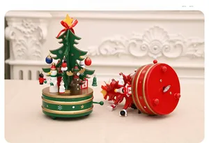 Mechanical rotating wooden Christmas music box with hand-painted reindeer and snowman
