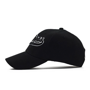 Detail of 3D embroidered Vegas script on a classic black cotton twill baseball cap