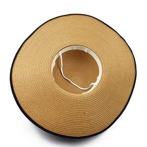 Wide brim straw hat with black ribbon edge and windproof strap for beach sun protection