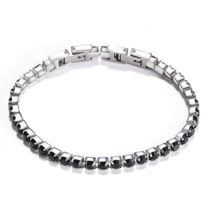 Adjustable silver stainless steel tennis bracelet featuring black cubic zirconia stones