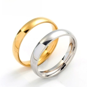 Polished minimalist stainless steel rings in gold and silver finish with smooth round surface