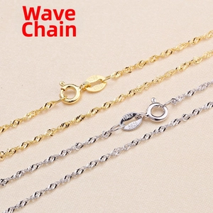 Macro shot of silver and gold water wave chains featuring S925 and Italy hallmark stamps