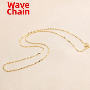 Close-up of golden water wave chain necklace with a high-shine finish and spring clasp