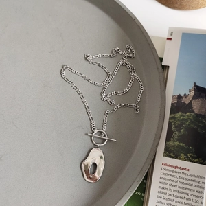 Minimalist 925 silver irregular oval pendant necklace with OT toggle clasp on grey plate