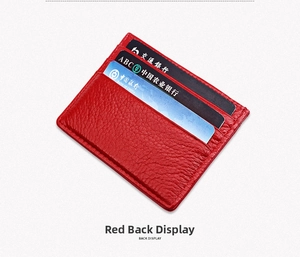 Detail view of red leather RFID card holder back with three slots and lychee texture