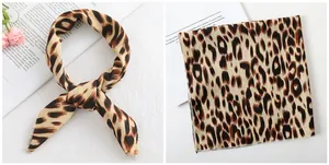 Detailed close-up of leopard print satin square scarf showing silk texture and stitching