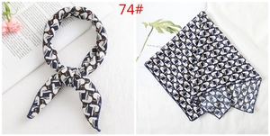 Navy blue silk square scarf with white seagull prints and contrast stitching detail