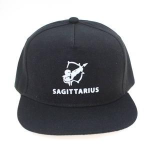 Close-up of Sagittarius themed glow-in-the-dark flat brim hip hop hat in black cotton