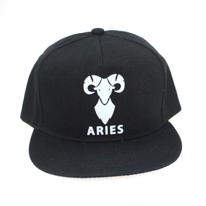 Detailed view of black Aries zodiac baseball cap with glow-in-the-dark ram print