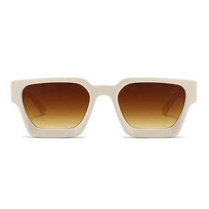 Close-up of retro thick-frame sunglasses in cream white with brown gradient lenses