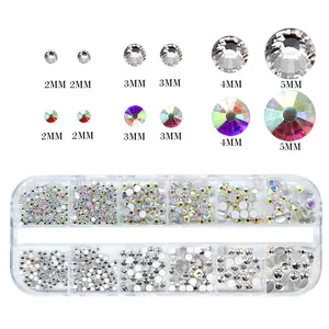 Size chart for 12-grid nail art rhinestones featuring clear and AB crystals from 2mm to 5mm