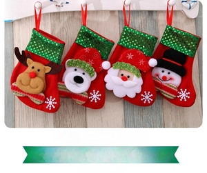 Set of four Christmas stockings with 3D Santa, reindeer, bear, and snowman designs