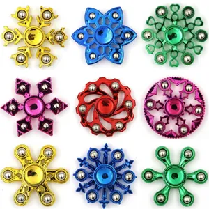 Nine colorful plated fidget spinners with 6 metal beads in diverse geometric shapes