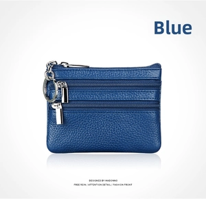 Detailed blue pebbled leather coin purse with triple zippers and metal keychain hook