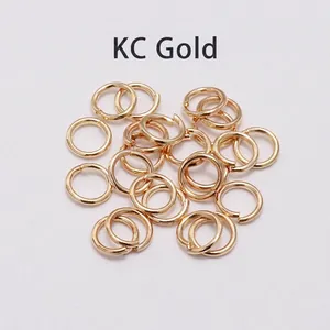 Macro detail of KC Gold open jump rings for DIY jewelry making and necklace assembly