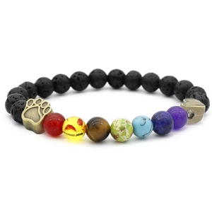 Detail of 7 chakra lava stone bracelet featuring heart beads and paw print pendants