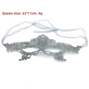 Silver lace masquerade mask with crown design showing 32x11cm dimensions and weight