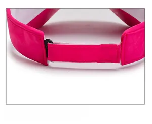 Detail of adjustable hook and loop fastener on rose red sports sun visor hat
